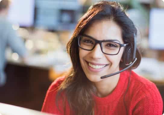 Customer Service agent smiling.